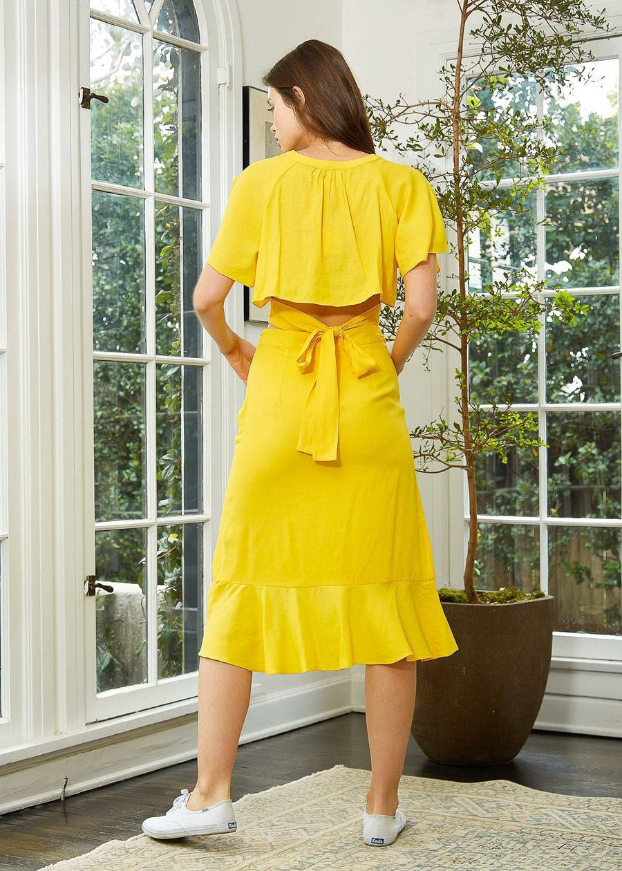 Women's Asymmetrical Hem Button Front Skirt in Yellow - shopatkonus