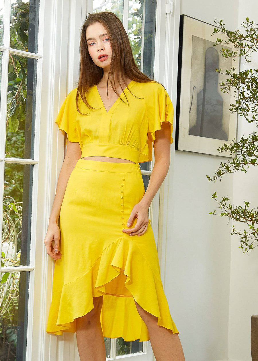 Women's Asymmetrical Hem Button Front Skirt in Yellow - shopatkonus