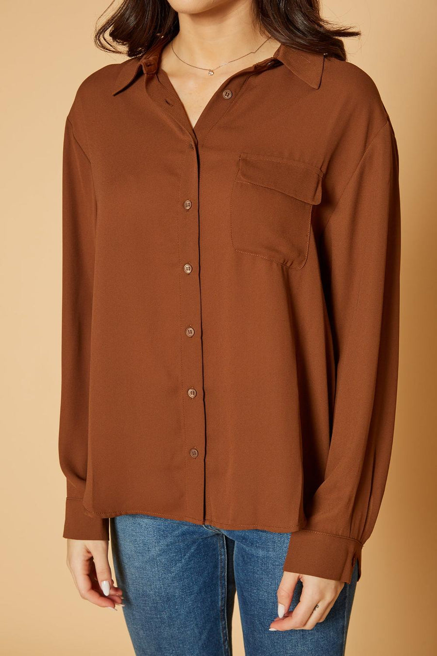 Pleione Women's Solid Low Back Button Shirt in Brown